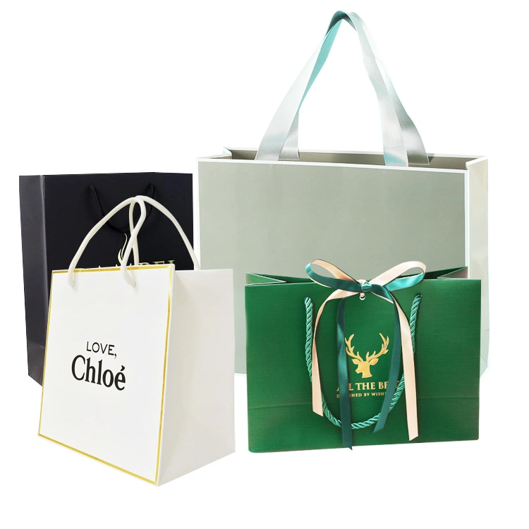 China Wholesale Luxury Printed Logo Custom Fashion Packaging Ribbon Handles Tote Paper Shopping Bags for Garment/ Wine/Christmas Packaging